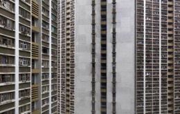 One flat is enough if you have worked in China the previous 12 months  